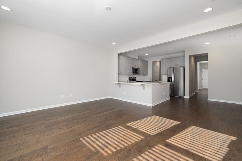 Kitchen & dining before staging: empty room